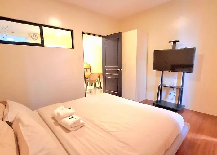 Bayview Luxury Condos: Poolside Balcony Retreats * Manila